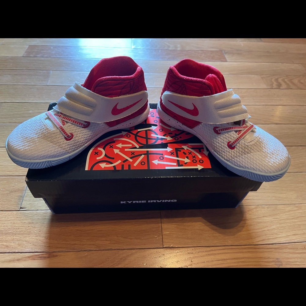 Very lightly used red and white Kyrie 2 (TD) size 9c Nike shoes.